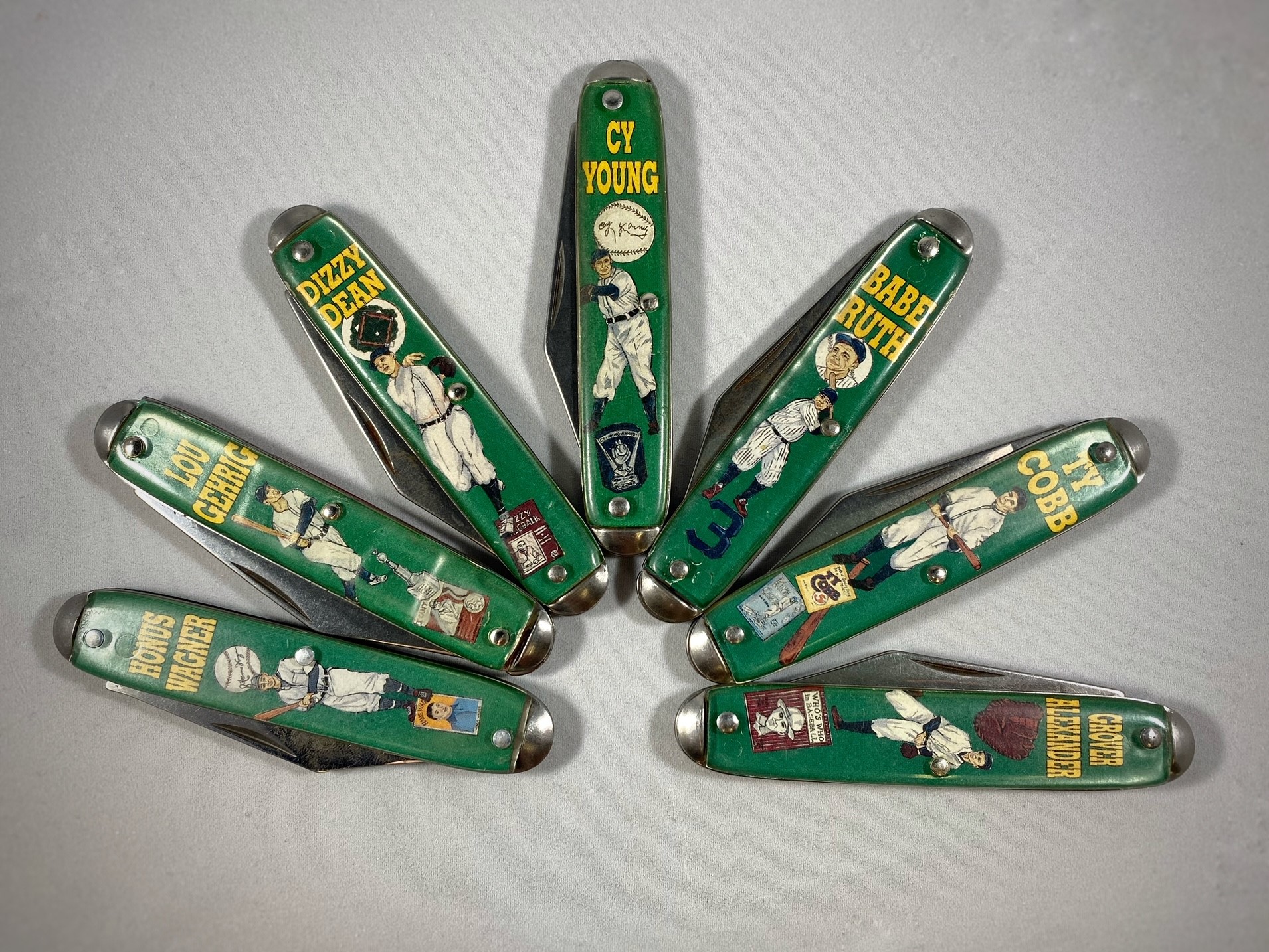 Lot 317: Vintage Novelty Knife Company Baseball-Themed Pocket Knives: Cy Young, Ty Cobb, Lou Gehrig, Grover Alexander, Babe Ruth, Honus Wagner, Dizzy Dean
